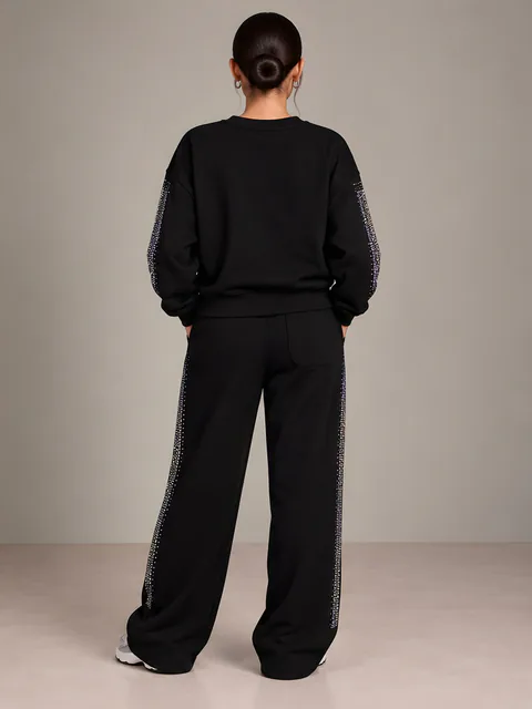 Black sweatshirt and trousers with crystals, back