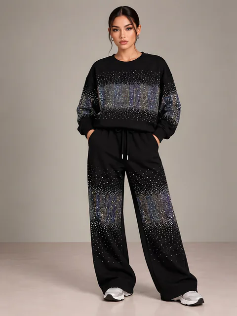 Black sweatshirt and trousers with crystals, front