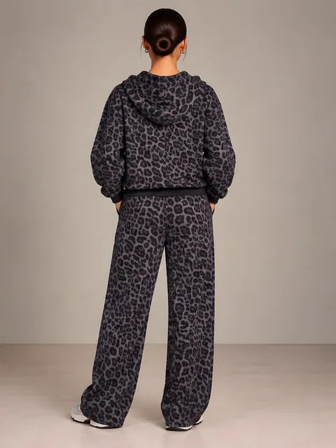 Grey leopard hoodie and wide trousers, back