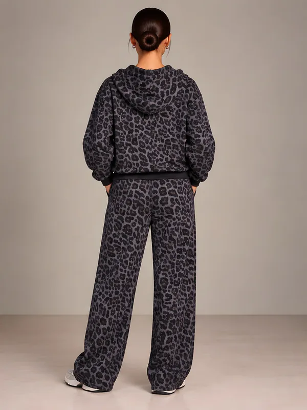 Grey leopard hoodie and wide trousers, back