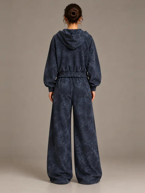 Washed navy cropped hoodie and wide trousers, back