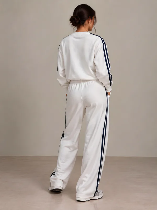 White track set with navy stripes, back